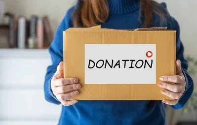 woman holding donation box charity 260nw 2557219281